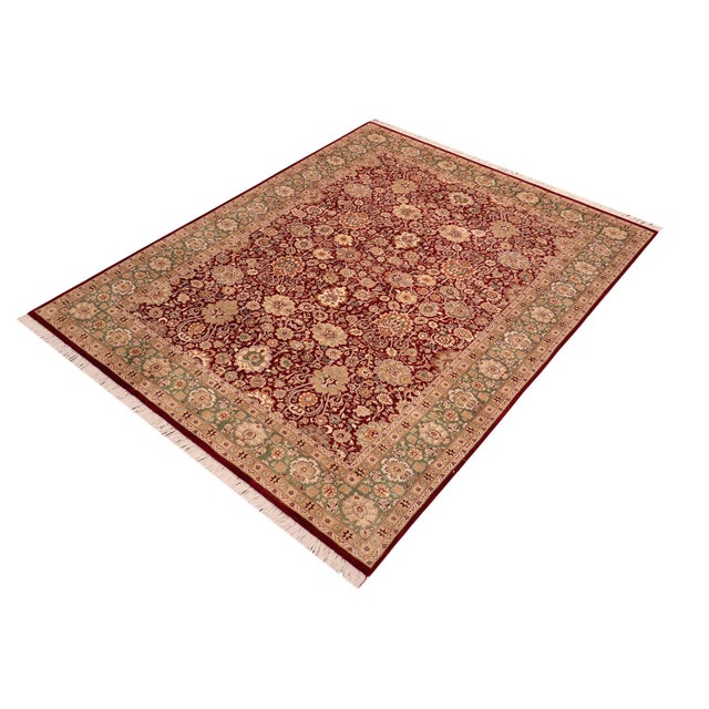 Designed with mesmerizing intricacy and gorgeous color palette, this hand-knotted masterpiece demonstrates the beauty and...
