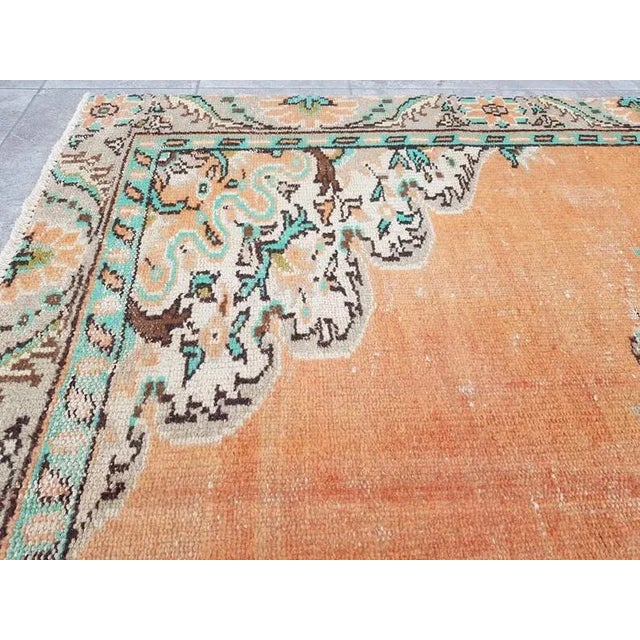 This is a vintage Turkish handknotted Anatolian OUSHAK rug. We collect Vintage rugs from Anatolia, which is the eastern part