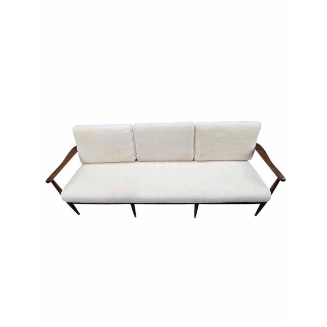 Danish Modern Oak Frame Sofa Newly Reupholstered in Ivory Sheep’s Wool Shearling by Ib Kofod-Larsen Elegant Danish modern...