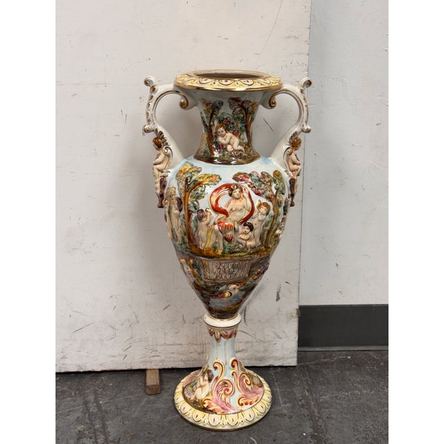 Design Plus Gallery presents an Italian Hand Painted Porcelain Urn from Capodimonte. This monumental porcelain urn...