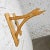 Awesome pair of mid-century modern rattan wall brackets with wood mounts and brass plated hooks. Wonderful condition,...