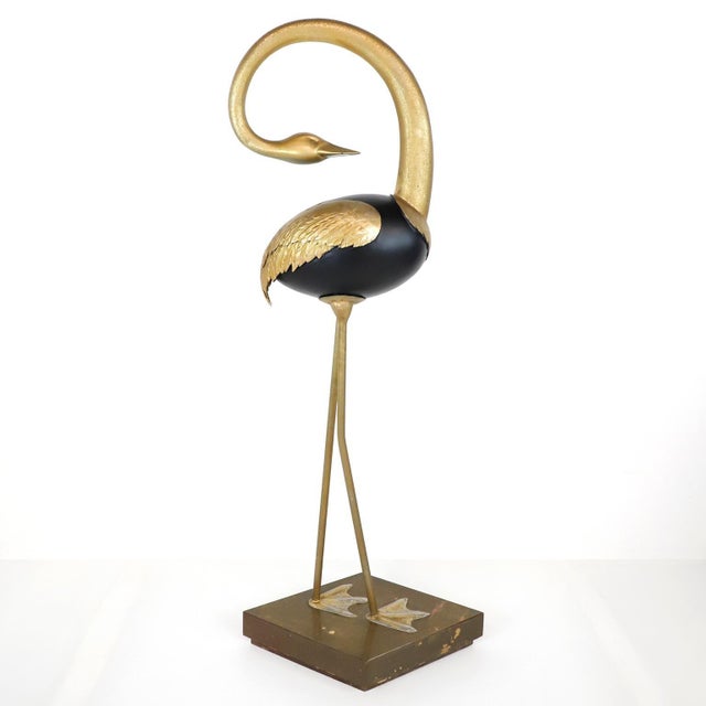 We offer this pair of big size Herons made in wood metal and brass base. circa 1970.
