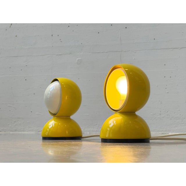 The iconic eclisse table lamp, designed in 1965 by vico magistretti for artemide, is considered one of the most famous...