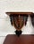This is a charming pair of antique Arts & Crafts or Gothic Revival wall brackets featuring shield-form supports, ebonized...