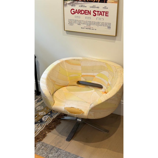 An authentic Patrick Norguet “Rive Droite” swivel lounge chair for Cappellini, designed in 2001 and upholstered in the...