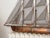 1975 copper sculpture of a sailing ship or schooner, signed C. Jeré for Curtis Jeré, the nom de plume of the company...