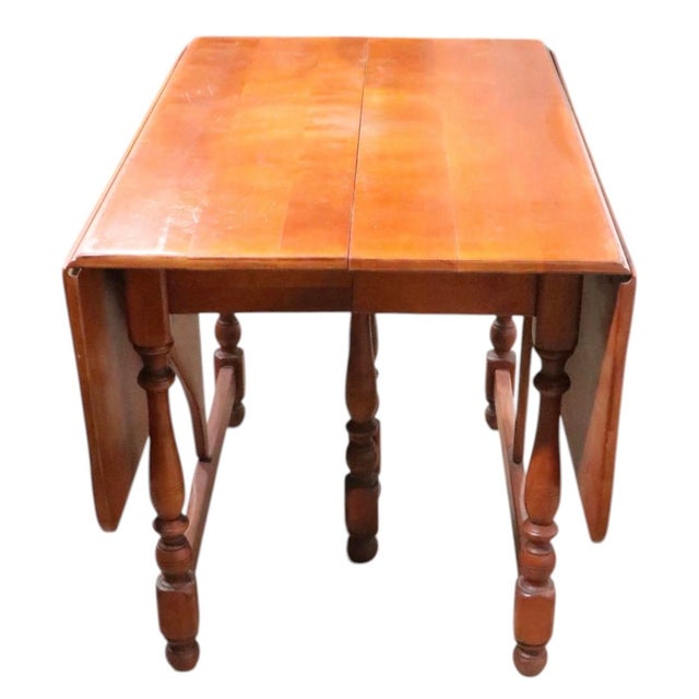 Classic Cushman Colonial Danby drop leaf extension dining table model N 7130. The table is in very good, original, clean...
