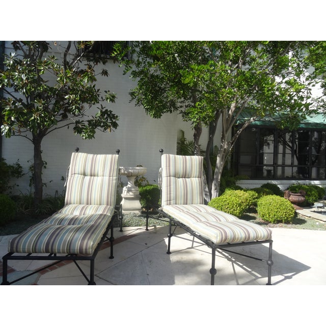 A great pair of Iron chaise lounges from Murry's Ironworks. They often get compared to Salterini funiture because of there...