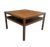 This is a mid century modern Widdicomb square cocktail table in warm walnut featuring clean architectural lines and an...
