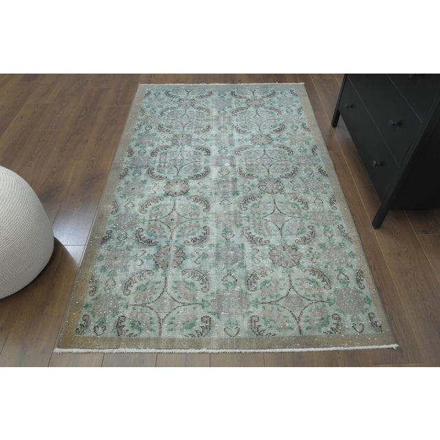 Vintage Turkish Hand-Knotted vintage rug is a semi-antique vintage area rug.'70s Eastern region of Turkey's unique rug is...