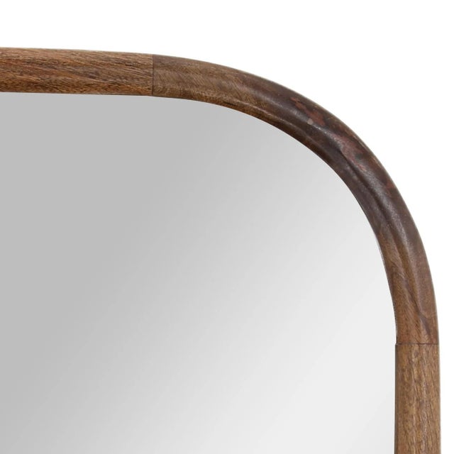 Beautiful mango wood mirror with rounded corners. Medium brown finish accentuating natural grain, which will vary with...