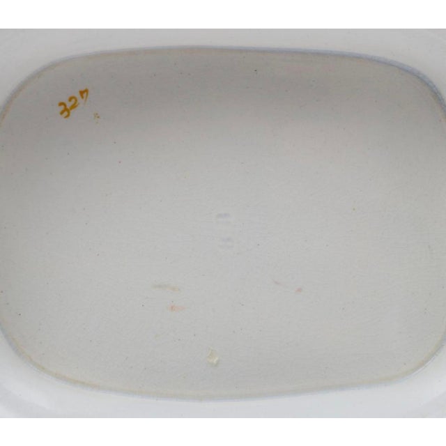 A very lovely english dinner or dessert service in remarkable shape. Unmarked. A very modern vibrant design Comprising:...