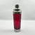 An exceptional mid-century modern italian cocktail shaker from the 1960s, featuring a striking, vibrant ruby red glass...