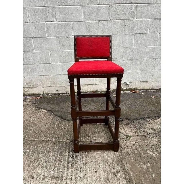 Pair of Vintage Jacobean Style Hardwood Bar Stools. Solid wood frame, brass nailed, very heavy and sturdy Upholstery is...