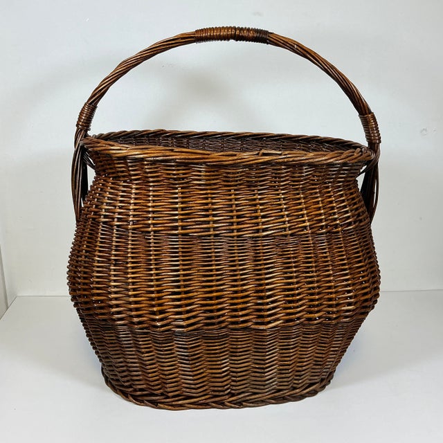 Vintage Home is pleased to present this gorgeous large scale French Market Wicker Basket. It’s a traditional weave of...