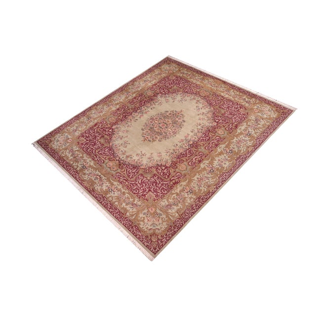 Designed with mesmerizing intricacy and gorgeous color palette, this hand-knotted masterpiece demonstrates the beauty and...