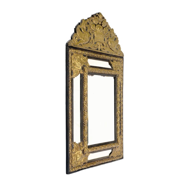 Mirror from France in the Napoleon III style. This piece is made of finely cast bronze ormolu, hand embossed, with...