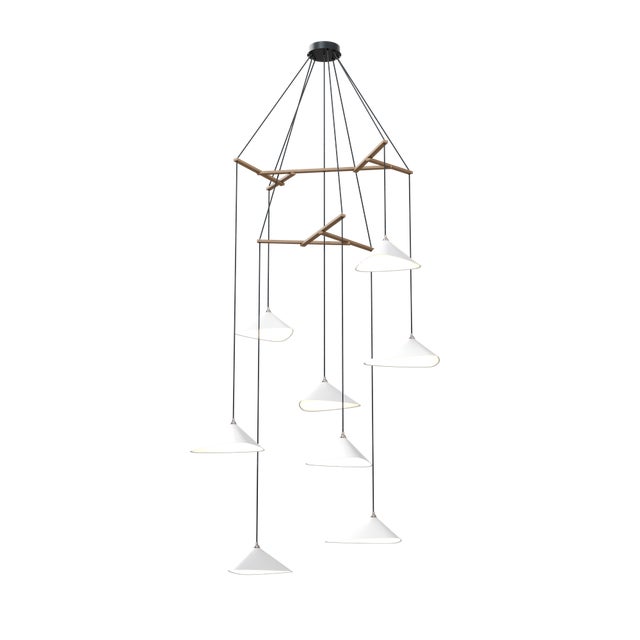 Emily is a series of handmade sheet steel lampshades in various finishes and spatial arrangements. The Vertical models of...