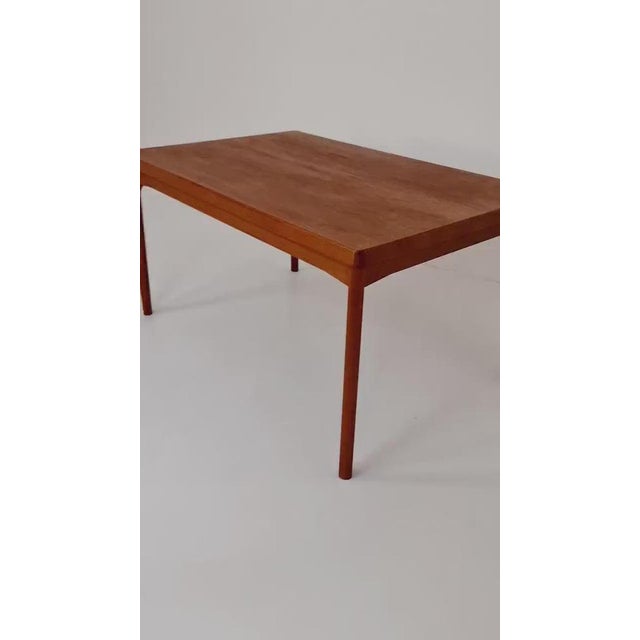 Danish Henning Kjaernulf rectangular teak table with two extension leaves, Denmark 1960s The table is in very good...