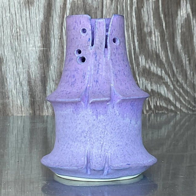 An amazing vintage Boho studio pottery vase. A chic little hand crafted vessel in a brilliant amethyst color. Signed on...