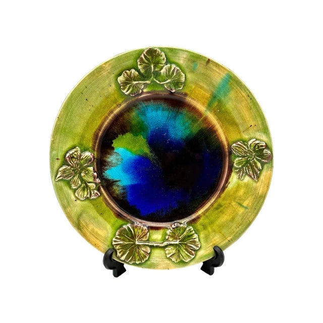 Add a unique touch to your home decor with this gorgeous handmade ceramic plate. The plate features stunning leaves design...