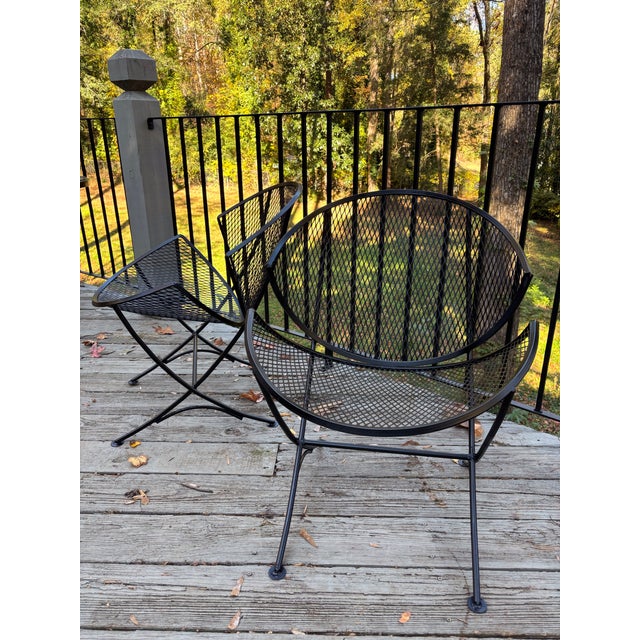 pair of orange slice chairs from Maurizio Tempestini for Salterini no maker's mark... recently sandblasted iron frame,...