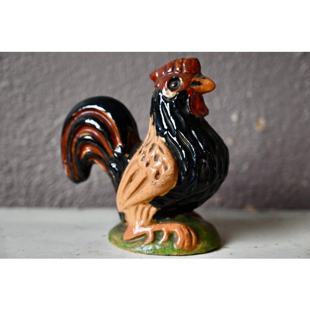 This ceramic piece radiates a rustic and authentic charm, typical of the glazed pottery of Soufflenheim in Alsace. The...