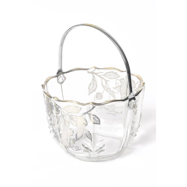 Lovely clear glass sterling silver overlay basket with leaf design in 4 areas along the bucket base. In two areas there...