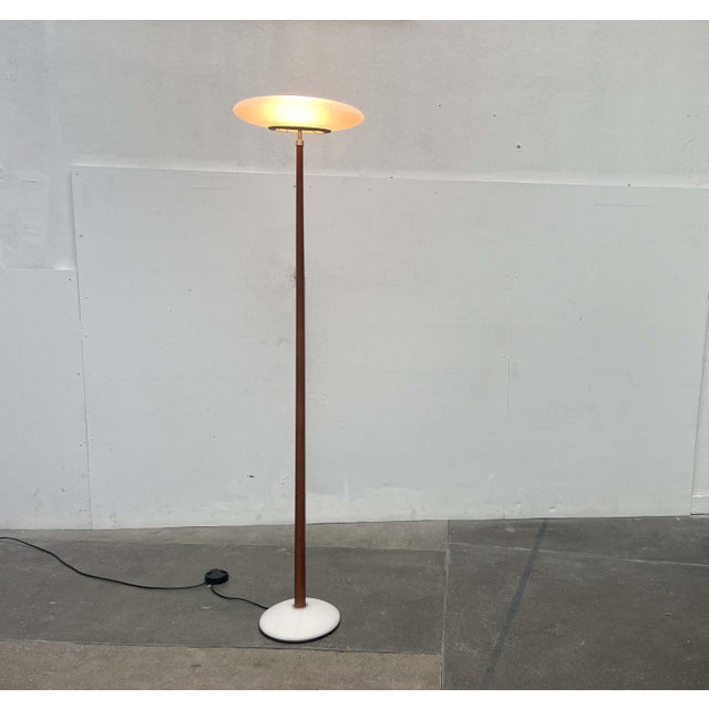 The floor lamp version of the Pao lighting series by Arteluce, designed by Matteo Thun. This is the version with a foil...
