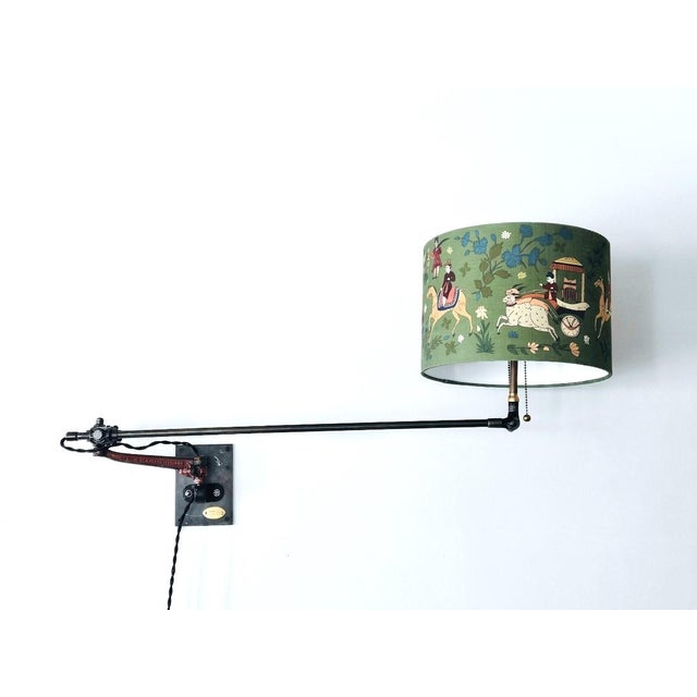 1920s O.C.White table lamp with an extension arm made into a wall lamp with lamp shade made in England. Four points of...