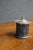 Wedgwood Black Basalt covered jar with molded Neoclassical relief decoration depicting classical figures, trees, and...