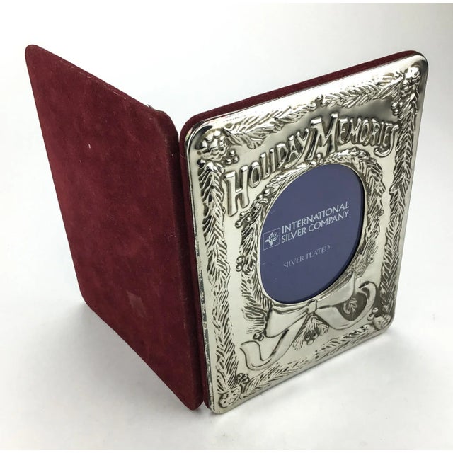 International Silver Company Holiday Memories Silver Plated photo library. Holds a small 3 x 3.5 front cover photo and...