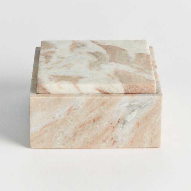 Honed to a semimatte finish, this stunning marble is specifically known for its unique darkBrown to lightBrown broad...