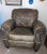 The first edition, purchased in the '90s It has a. vintage patina that can't be purchased. It is a Barcalounger that is...