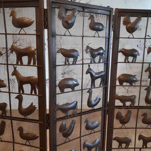 This vintage metal /wrought iron room divider is often attributed to / in the manner of the French artist Jean Touret for...