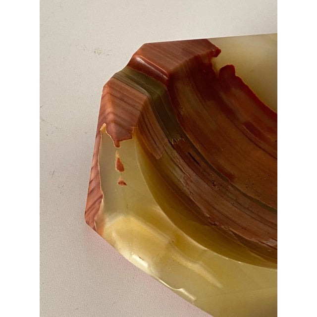 This Ashtray or vide Poche, is in Onyx with a beige and pink color. It has been made in Italy Circa 1950. The shape is...