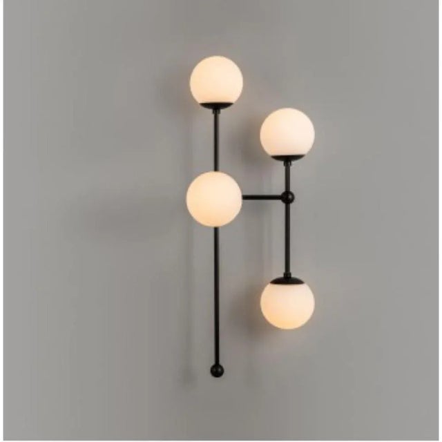 Armstrong 4 r wall sconce by schwung dimensions: w 35 x d 33 x h 92 cm materials: brass, opal glass weight: 6 kg finishes...