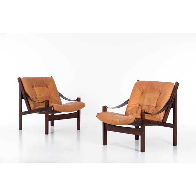 Great pair of safari chairs model Hunter designed by Torbjørn Afdal, produced by Bruksbo, Norway. Original leather...