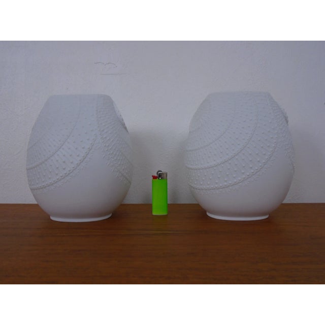 A pair of bisque porcelain op art vases by heinrich m. Frey for ak kaiser. Inscribed on the underside. This piece has an...