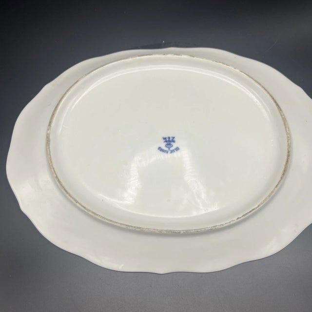 Beautiful vintage Danish elegance from Royal Copenhagen. This stunning Mid-Century Modern “Blue Fjord” blue fluted oval...
