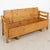 19th century Swedish bench, crafted in pine with a warm aged patina enhanced by a waxed finish. Simple carved details...