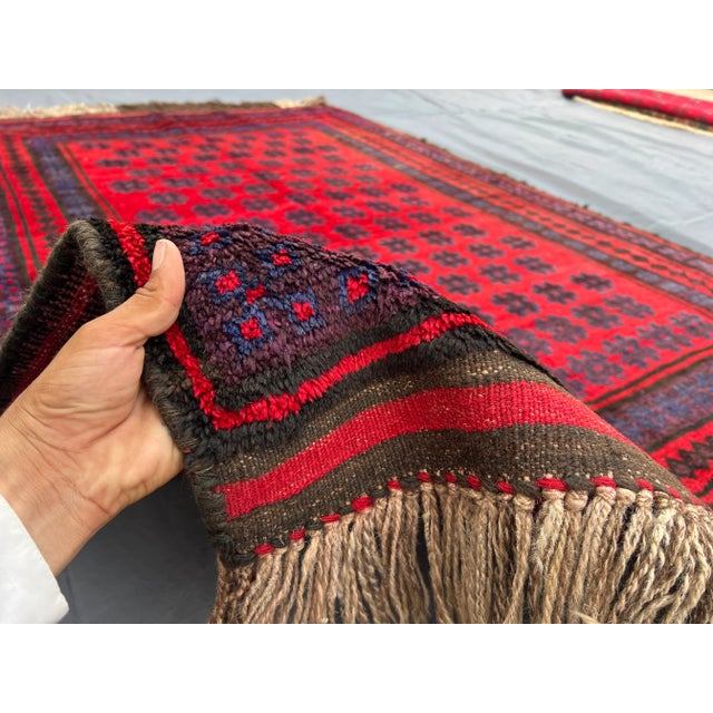 Red Vintage Afghan Baluchi Hand-Knotted Wool Rug With Tribal Repeating Gul Rug For Sale - Image 8 of 14