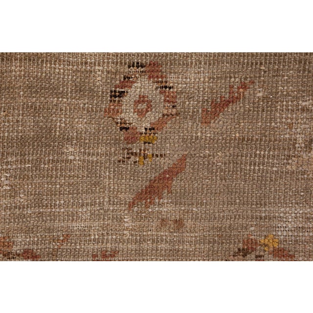 This exquisite antique Turkish Ghiordes rug, dating from the 1860s, is a remarkable example of traditional Anatolian...