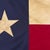 This vintage Texas flag is made from a cotton cloth with fully sewn star and panels. Please note overall staining and...