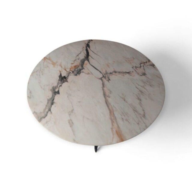 Round dining table with a lacquered wooden base, featuring a Mid-Century Italian design. Topped with a beautiful round...