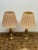 Design Plus Gallery presents a Pair of Stiffel Table Lamps. The lamps are from the mid to late 20th century and have cast...