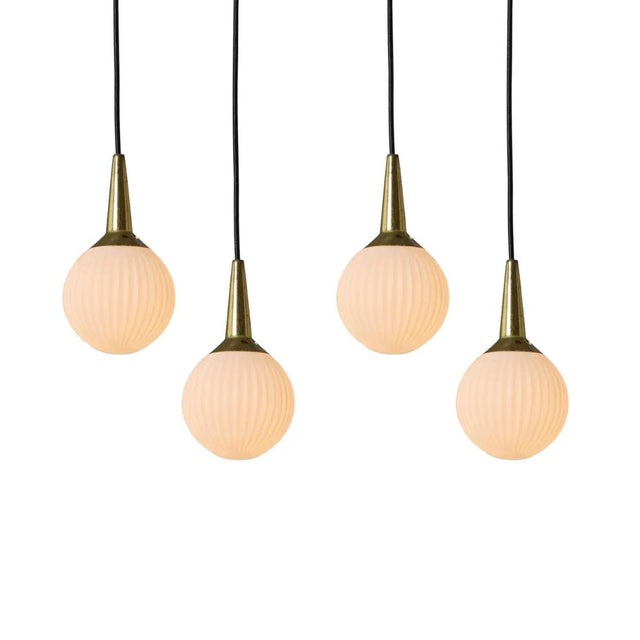 1950s Brass & Opaline Glass Pendant Attributed to Stilnovo. Executed in sculptural cylindrical opaline glass with brass...