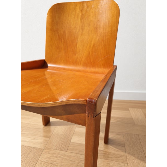 Italian-made chair from the 1970s, attributed to the refined design of Afra and Tobia Scarpa for Molteni. The frame is...