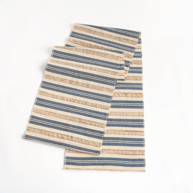 Add a natural element in a traditional striped pattern to the table with our handmade water hyacinth and cedar root...