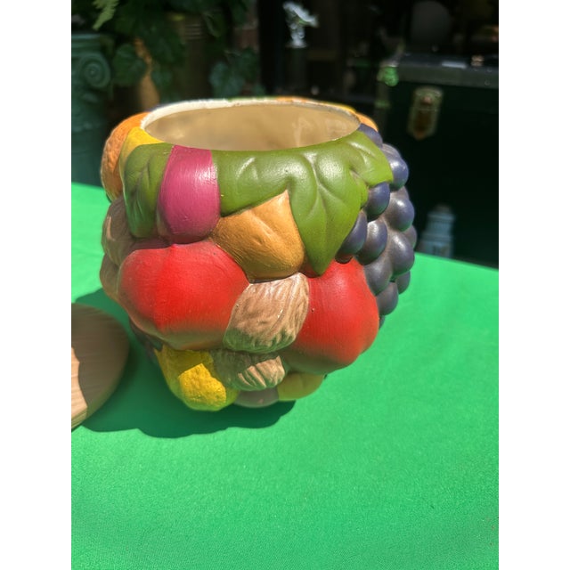 Up for consideration is a beautiful vintage ceramic hand painted fruit style cookie jar. This would look lovely in your...